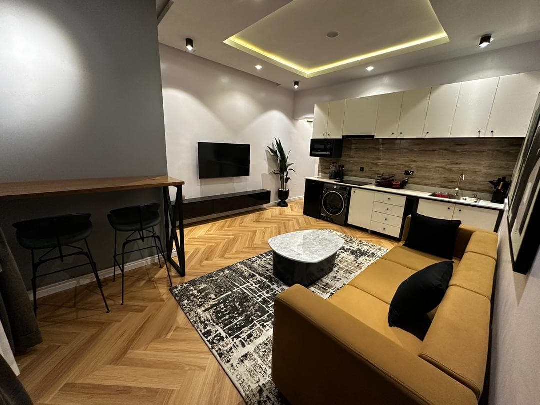 Tan — Elegant 1-Bedroom Apartment - Image 4